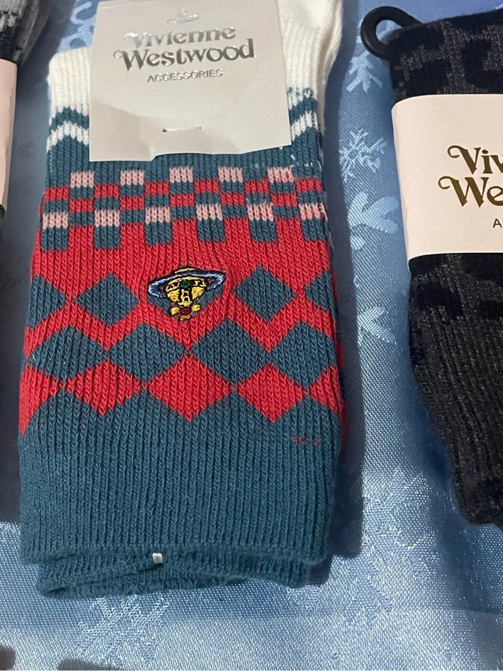 7 pairs Vivienne Westwood Cable Knit Socks in Orange, Cream & Maroon